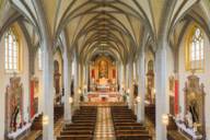 Columns and an altar stand in the late Gothic collegiate parish church